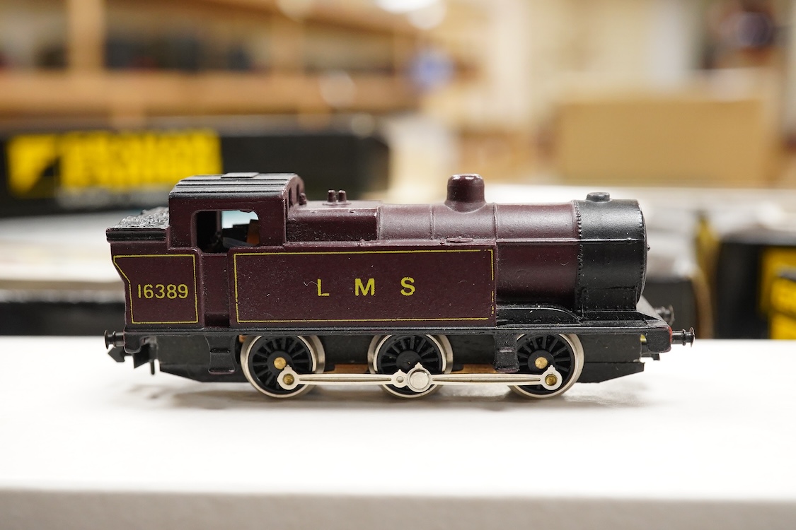 Thirteen N gauge railway by Graham Farish, etc., including two locomotives; a BR Class 4 0-6-0 tender locomotive, 4232, and an LMS 0-6-0T locomotive, 16389, together with two bogie coaches, eight freight wagons, and a Pe